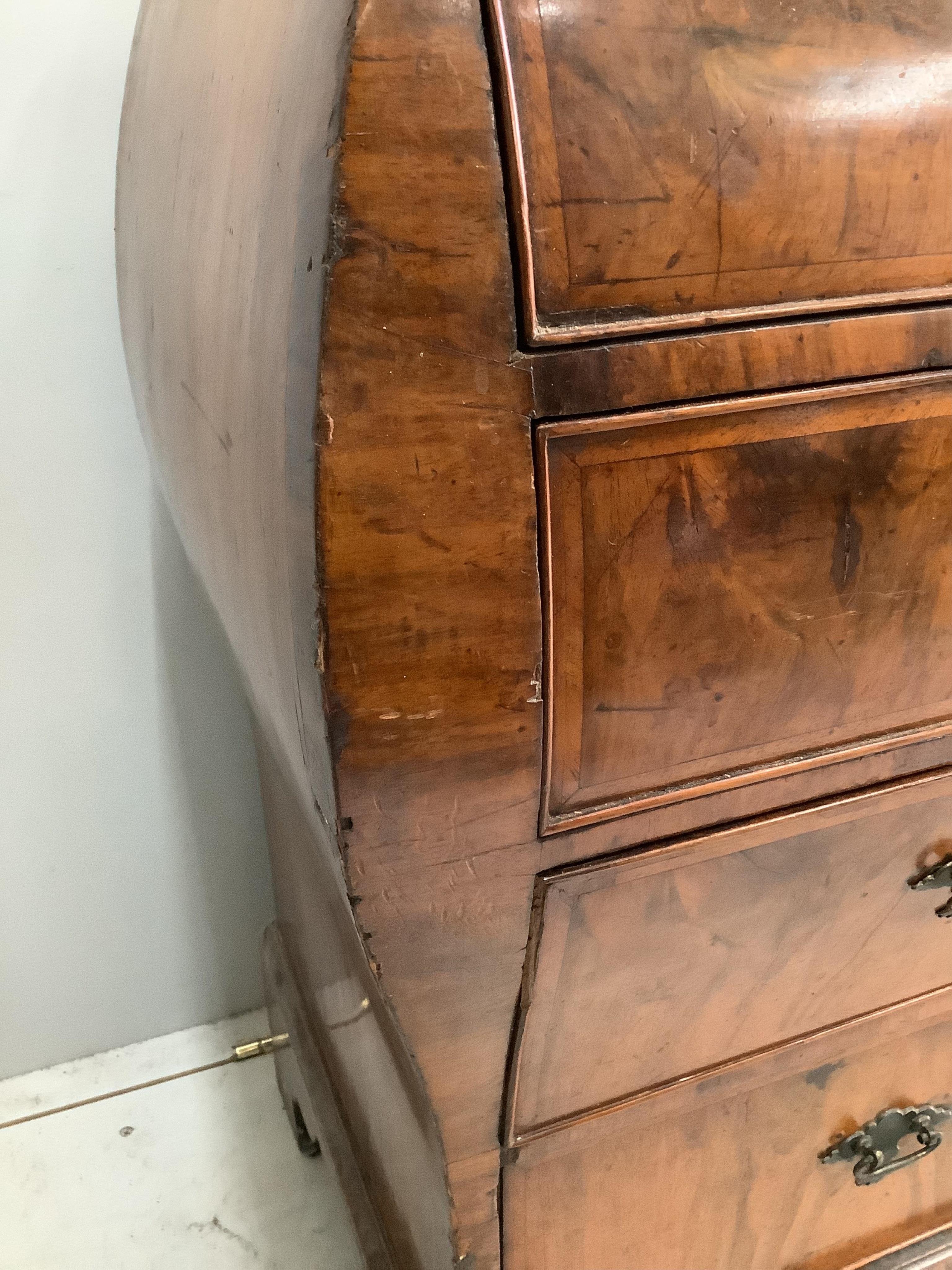 A 19th century and later Dutch bombe walnut chest, width 88cm, height 82cm. Condition - faded top, later alterations, fair